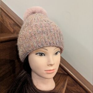 Norla Canada Pink multicoloured yarn cable knit beanie hat with faux fur pom pom